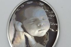 Portrait on steel pendant