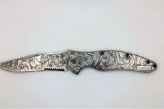 Kershaw Shallot knife with acanthus leaf scroll engravings